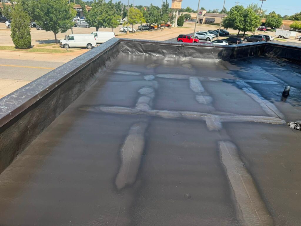 Commercial Flat Roof — Tree & Water Tower — photo 15