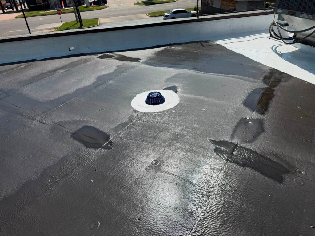 Commercial Flat Roof — Tree & Water Tower — photo 21