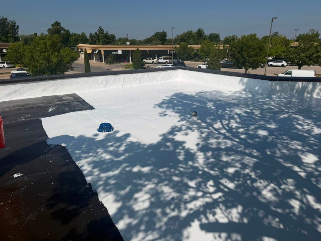 Commercial Flat Roof — Tree & Water Tower — photo 22