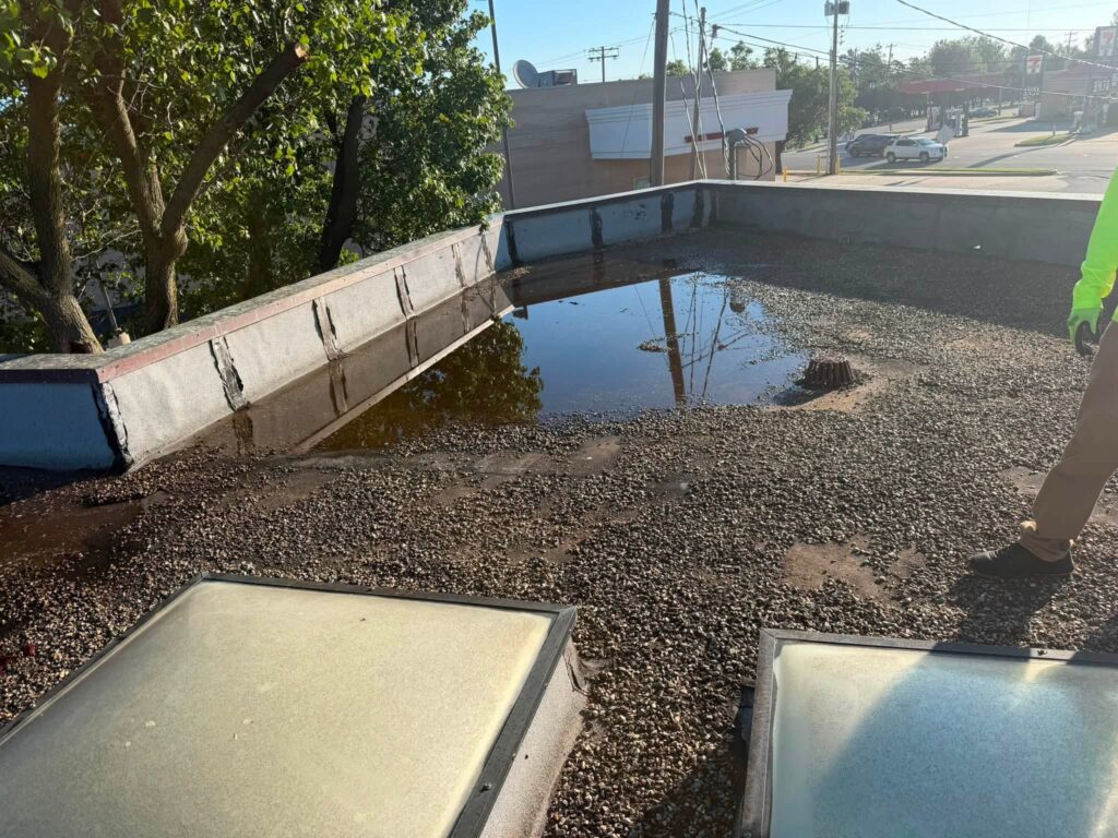 Gravel Flat Roof with Skylights — photo 3