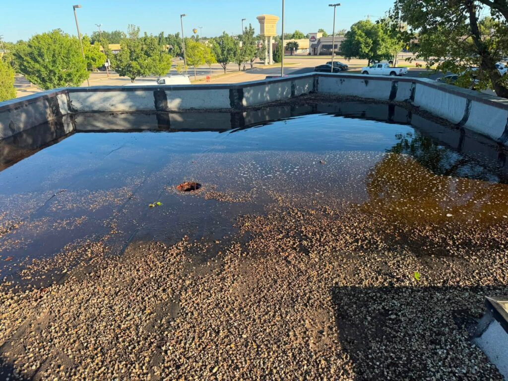 Gravel Flat Roof with Skylights — photo 4