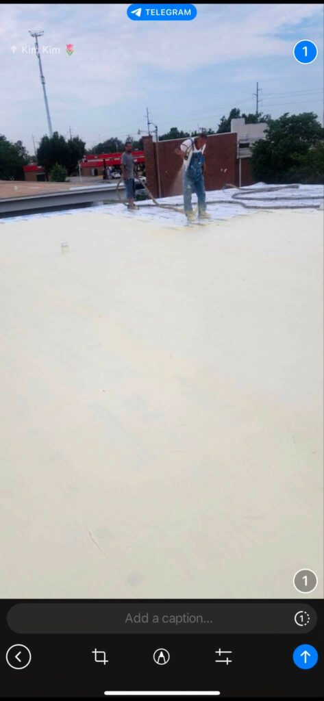 Spray Foam Roof — Red Brick Building — photo 1
