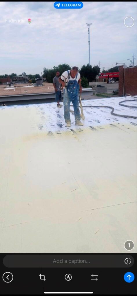 Spray Foam Roof — Red Brick Building — photo 3