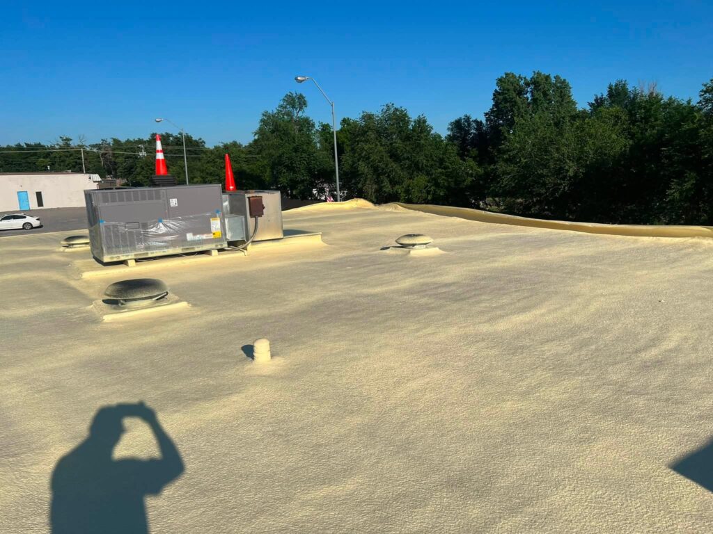 Spray Foam Roof — Red Brick Building — photo 5
